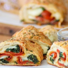 Freshly Baked Italian Bread Stuffed with Spinach and Alfredo Cheese